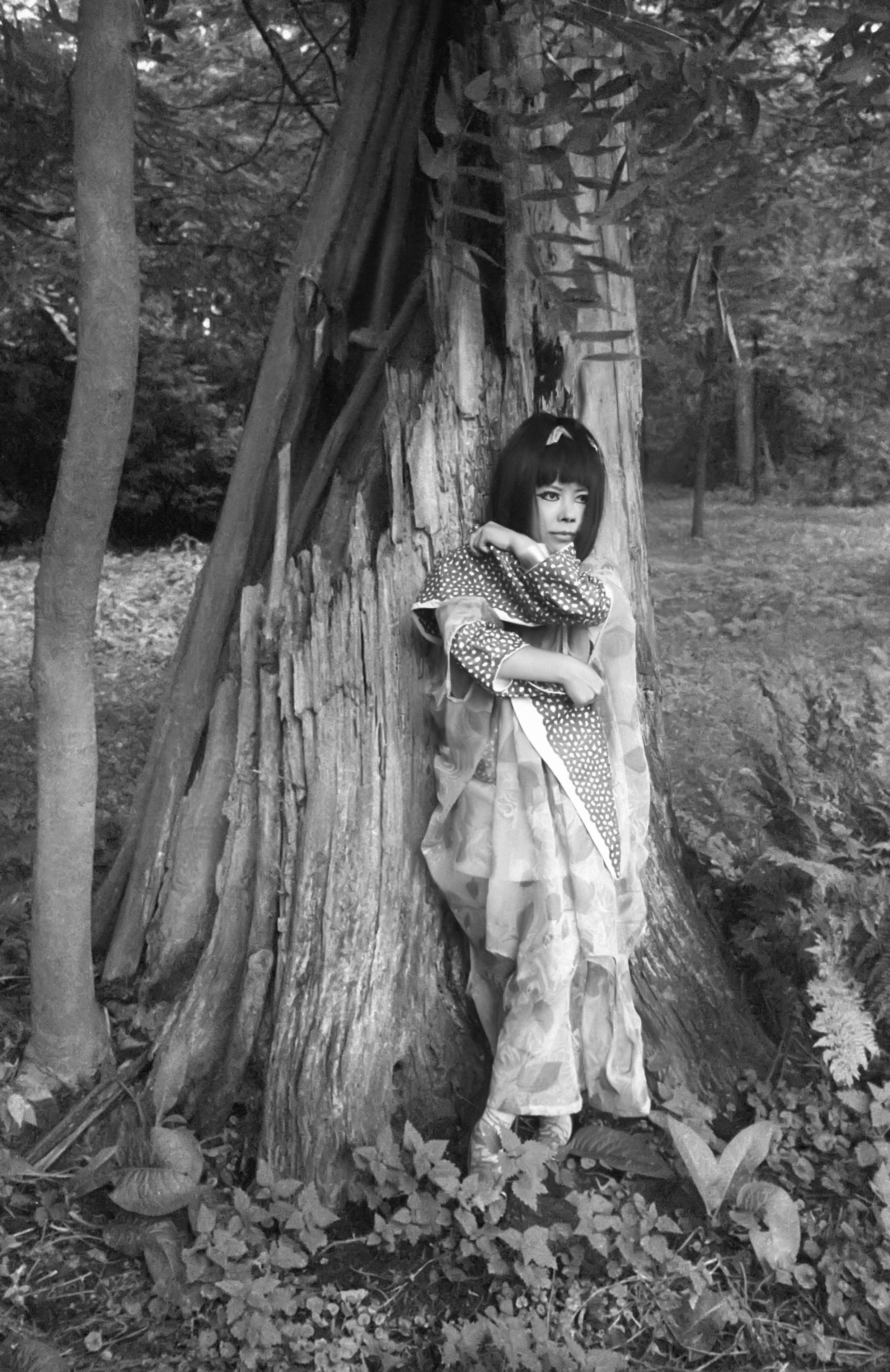 Spirit Girl Emerging from Hollow Tree