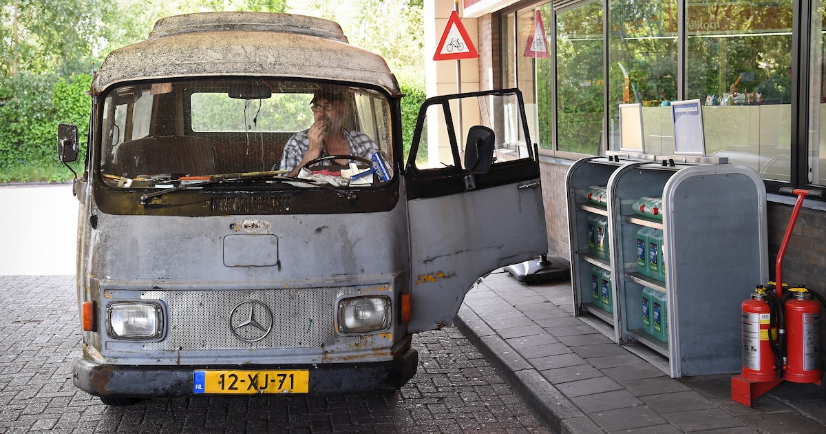 A modern electric vehicle charging at a station, representing the transition away from internal combustion engines.