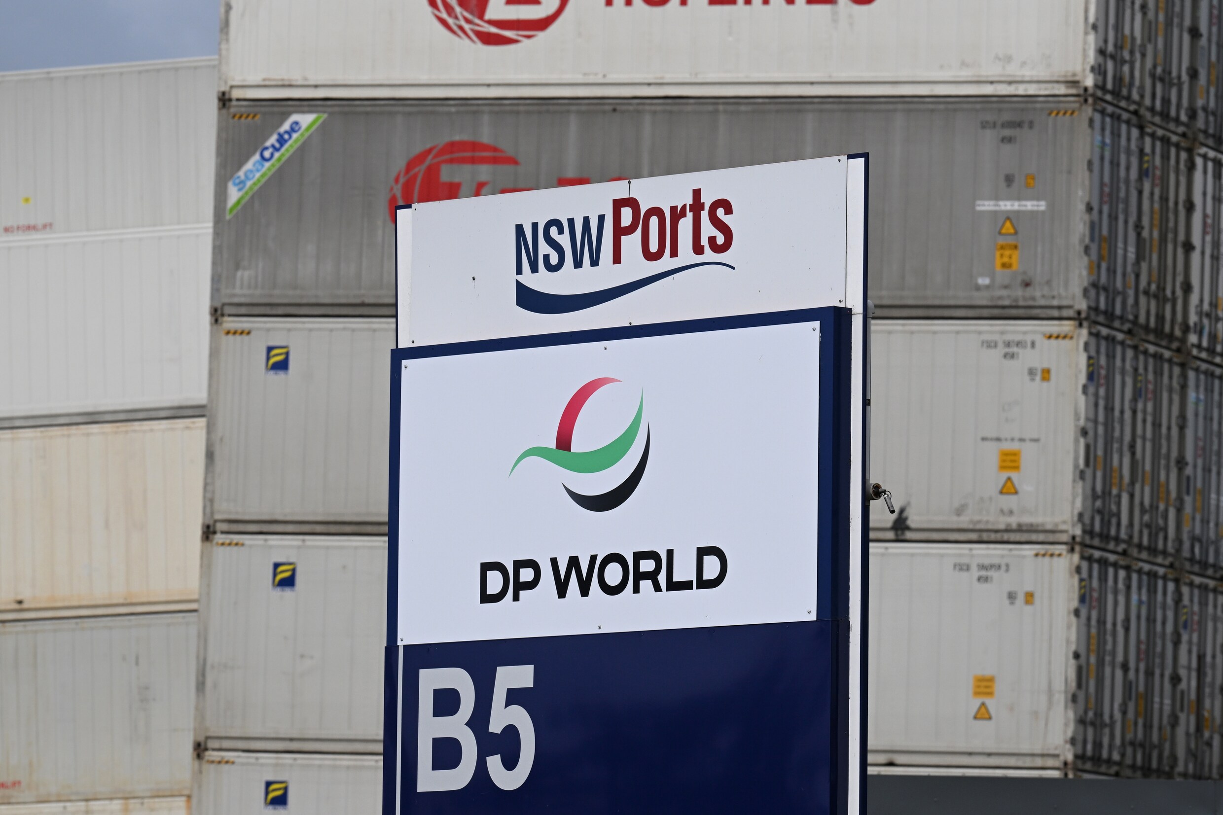 Australische havens weer open na cyberaanval, wel achterstand van 30. ...