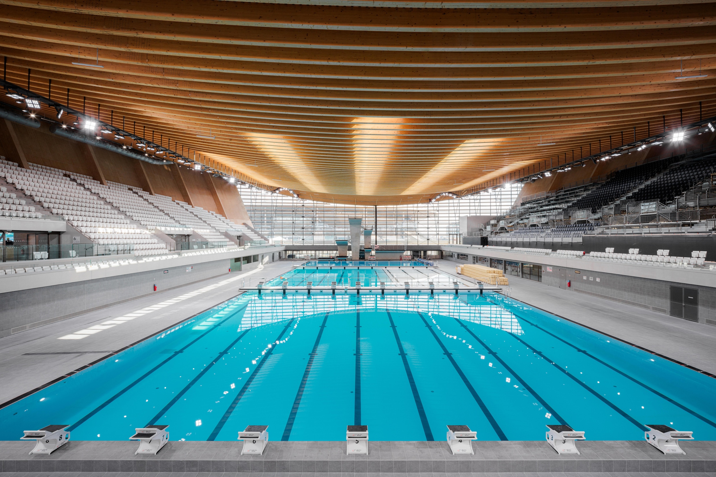 Het nieuwe olympisch zwembad in Parijs moet de hele buurt een boost ...