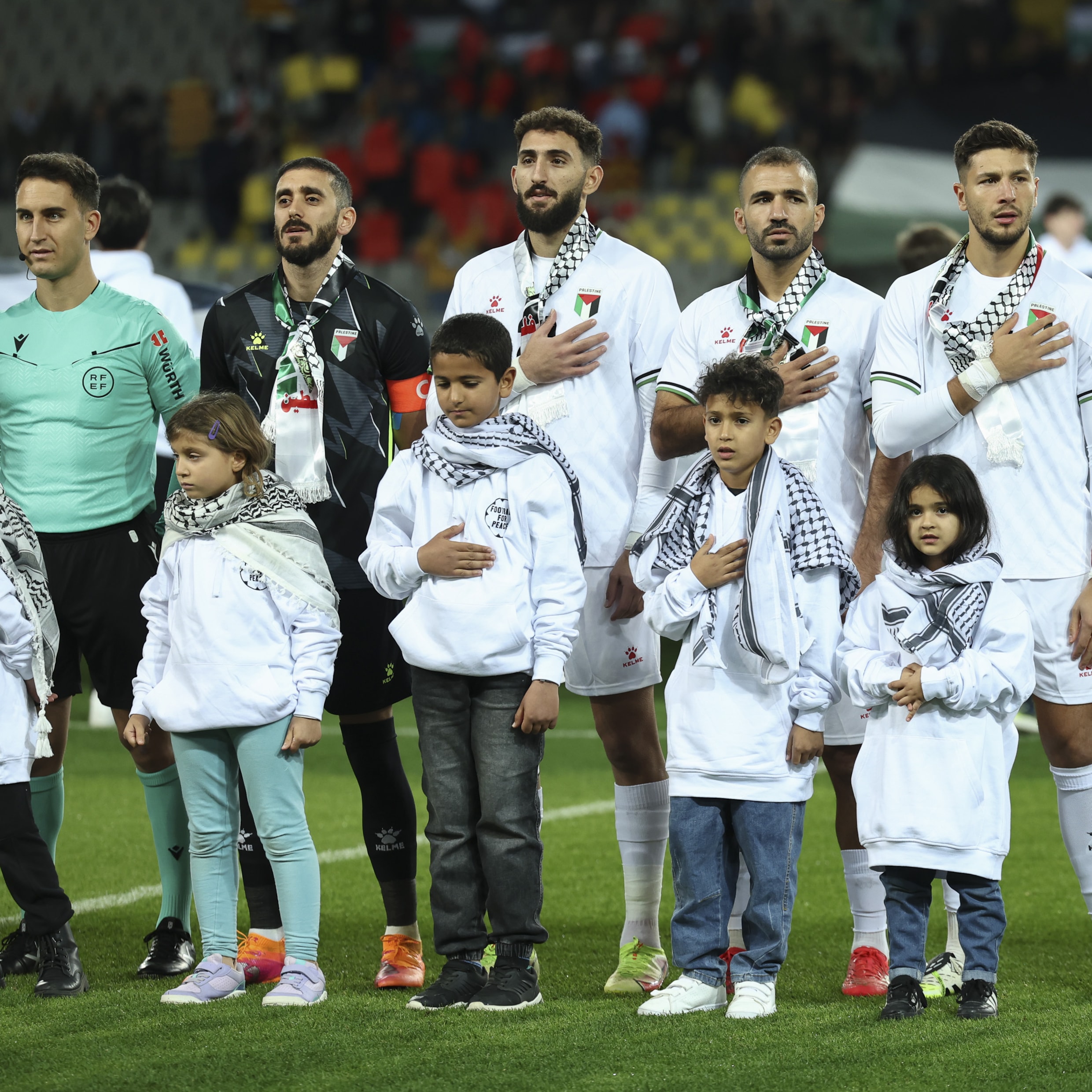 De spelers van Palestina voorafgaand aan de wedstrijd tegen Catalonië in Barcelona.