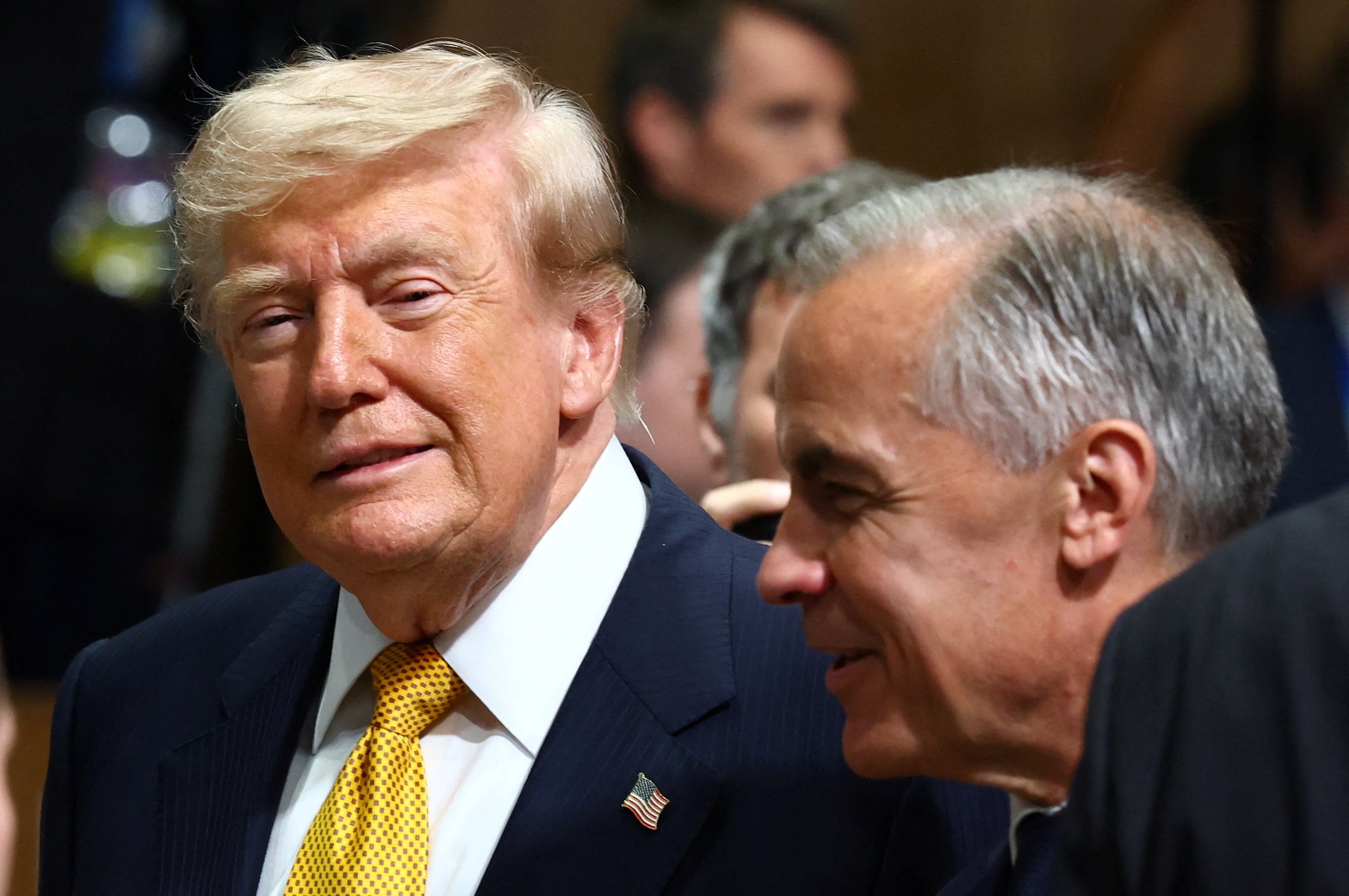 President Donald Trump en de Canadese premier Mark Carney bij de Navo-top in Turkije eerder deze maand.