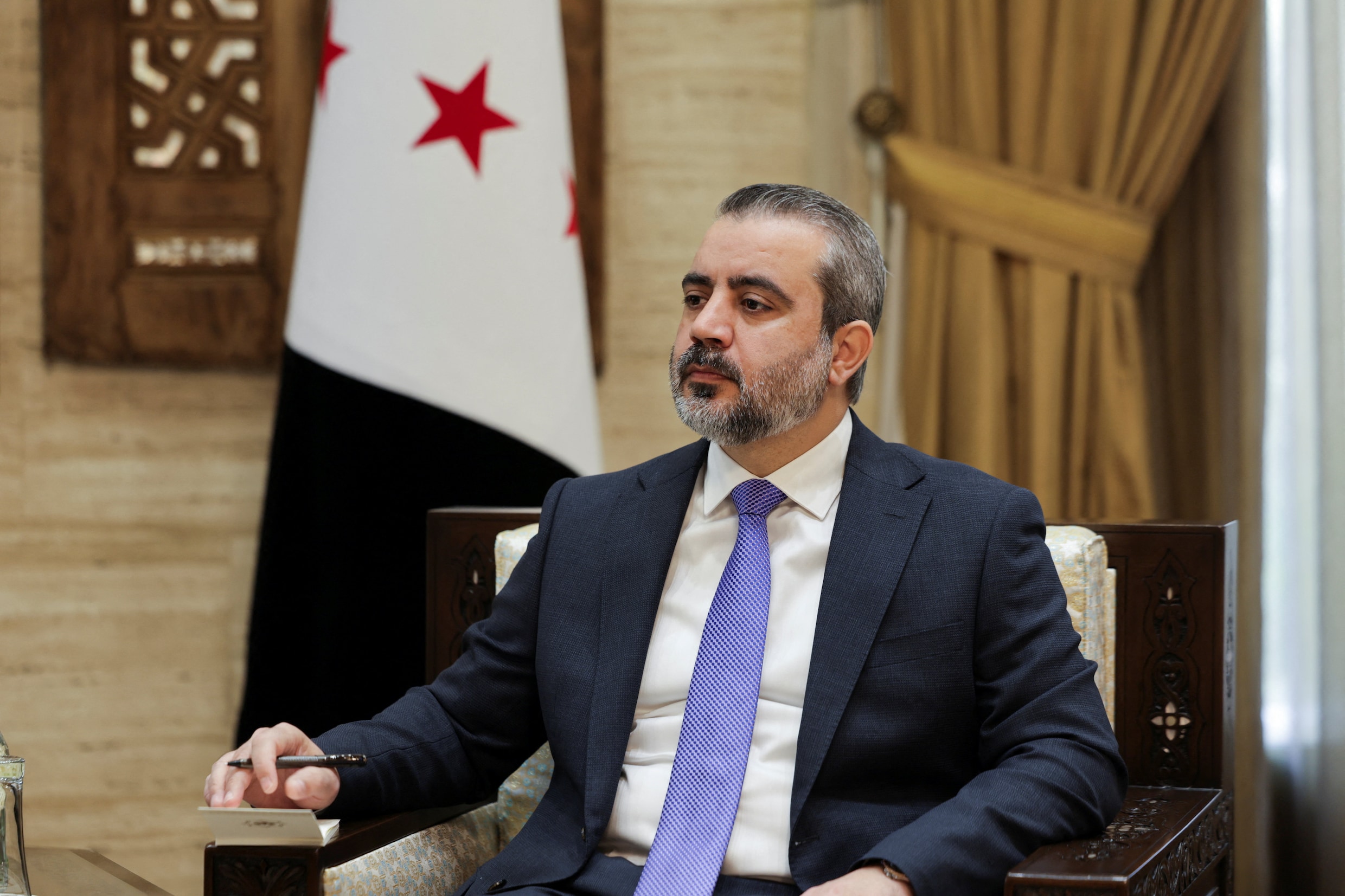  De Syrische minister van Buitenlandse Zaken Asaad al-Shaibani.