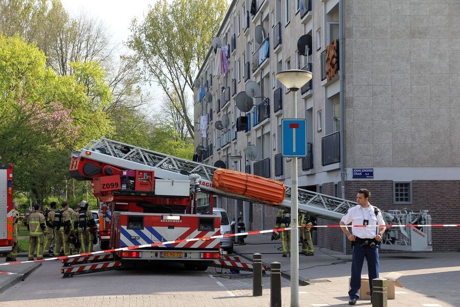 Dertien gewonden bij woningbrand Amsterdam